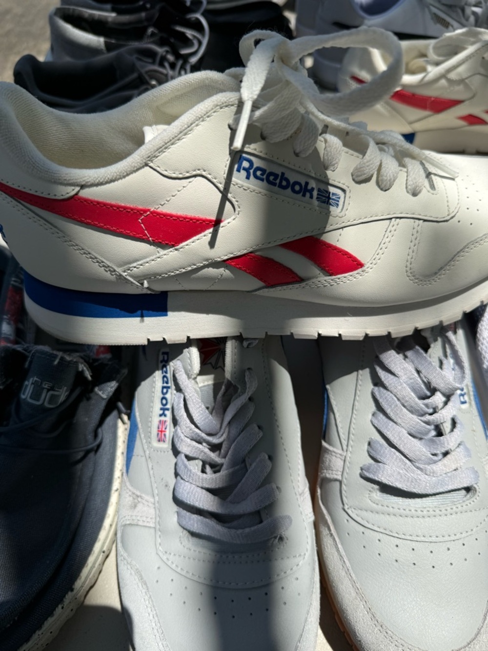 Reebok Men's White Leather Sneakers with Red & Blue Accents